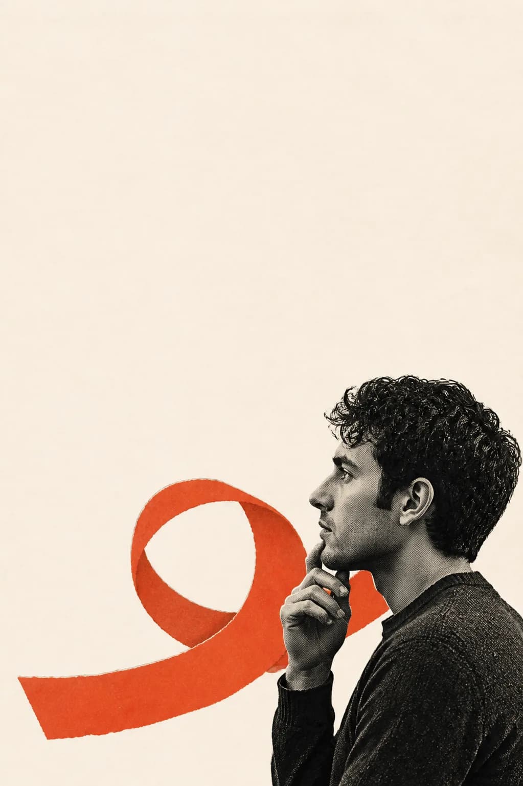 A thoughtful man in profile beside one looping orange paper shape